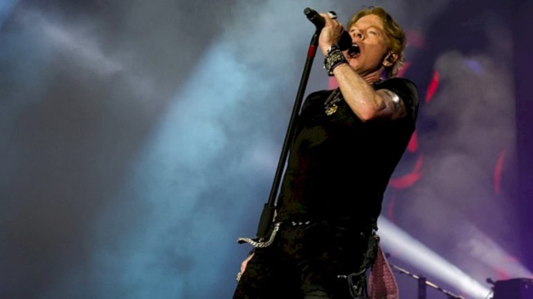 axl-rose-met-ozzy-osbourne-for-first-time-at-back-to-the-beginning-concert