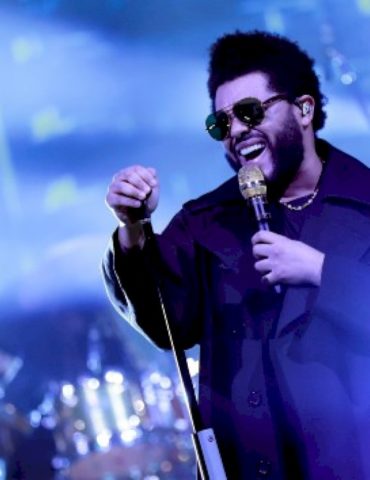 the-weeknd-roots-for-home-team-toronto-blue-jays-in-new-video