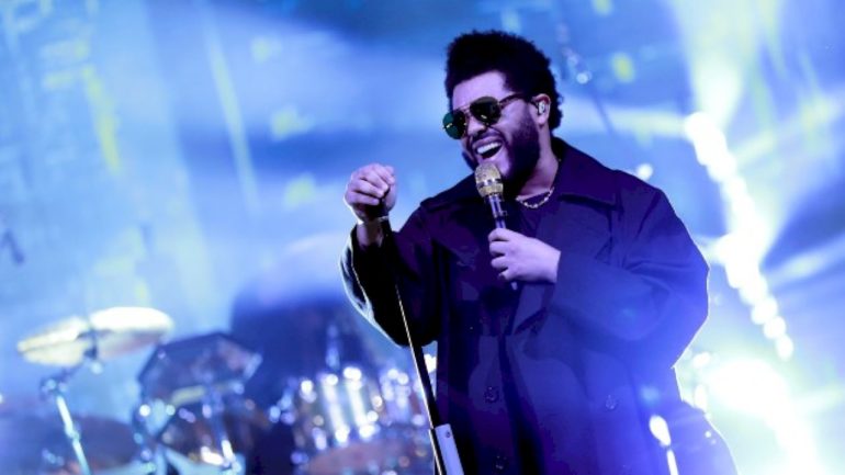 the-weeknd-roots-for-home-team-toronto-blue-jays-in-new-video