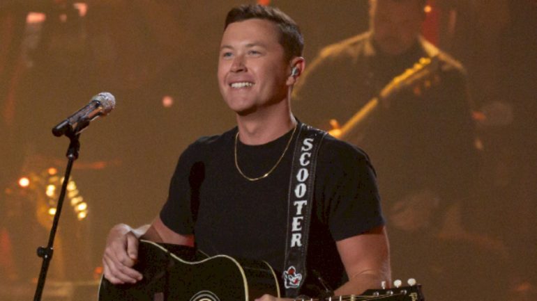 from-‘3-rex’-to-‘jurassic-park,’-it’s-a-dinosaur-world-for-scotty-mccreery