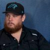 luke-combs-keeps-pounding,-teams-with-carolina-panthers-for-new-merch-line