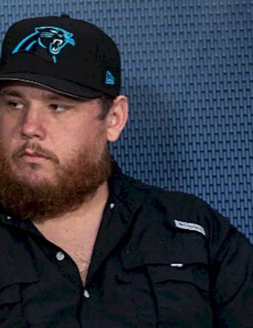 luke-combs-keeps-pounding,-teams-with-carolina-panthers-for-new-merch-line