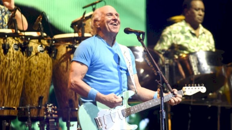jimmy-buffet’s-ashes-smuggled-into-2024-rock-hall-induction,-says-kenny-chesney