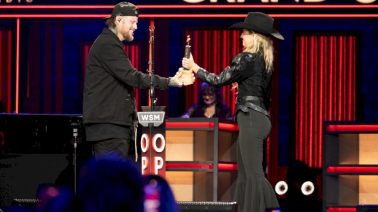 lainey-wilson-officially-inducts-jelly-roll-into-the-grand-ole-opry
