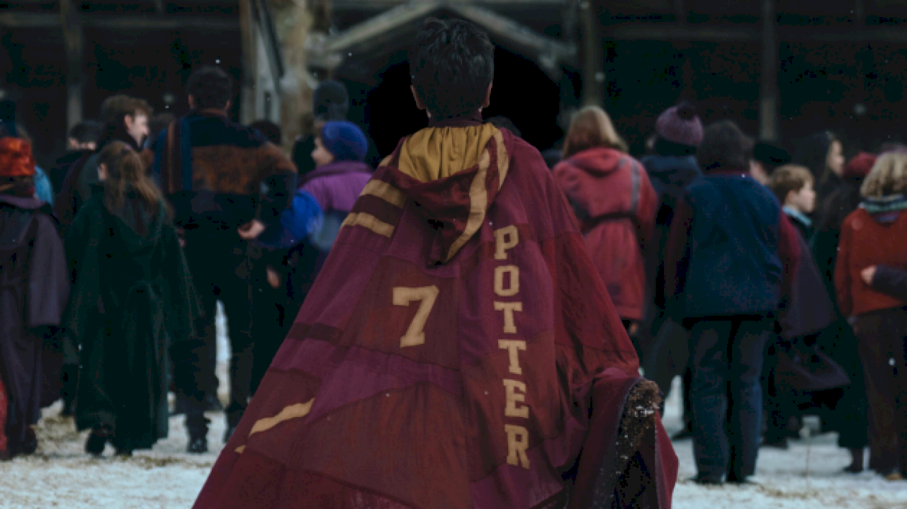 ‘harry-potter’-first-look-finds-gryffindor-wizard-heading-to-quidditch-pitch