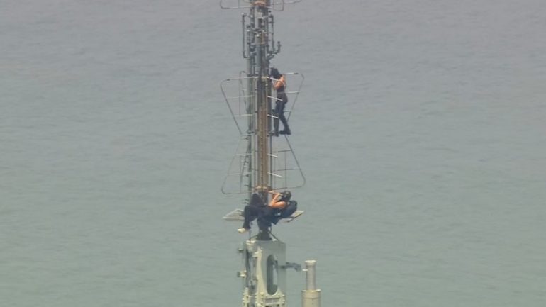 new-details-emerge-about-empire-state-building-daredevil-climbers,-as-couple-released-from-jail
