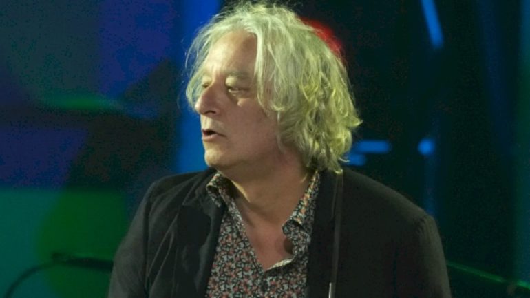 rem.’s-peter-buck-releases-new-single-with-band-drink-the-sea